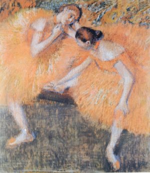 Photo de Deux danseuses en jupes oranges
