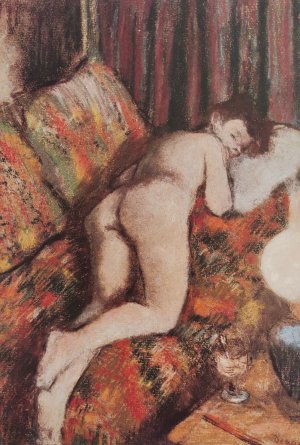 Photo de Femme nue allongée sur un divan