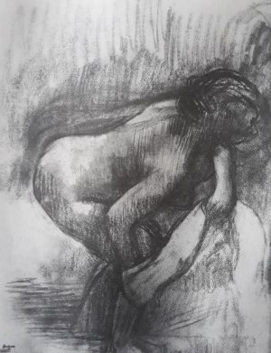 Photo de Woman drying herself after getting out of the bath