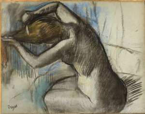 Photo de Seated Woman Brushing Her Hair