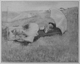 Jeune fille couchée sur l'herbe