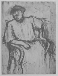 Femme assise dans un fauteuil