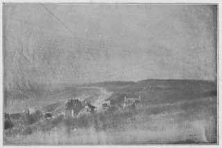Maisons sur des falaises contournant une baie