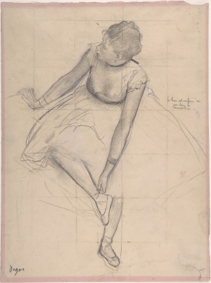 Photo de Danseuse ajustant son chausson